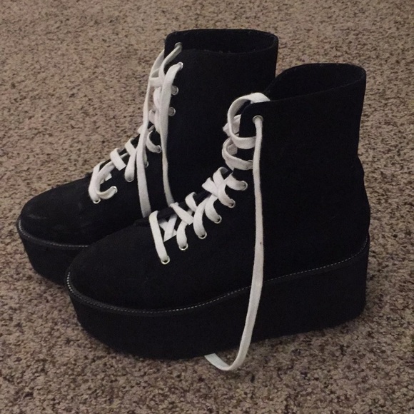 black boots with white laces